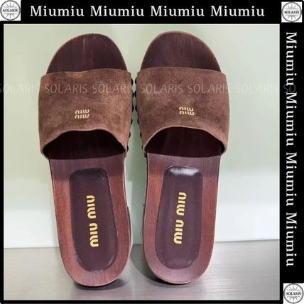 Miu Miu フェイデッド クロッグサンダル | ブラウン | FARFETCH JP