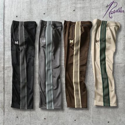 ファッションの ブラウン（茶色）系 Needles(ニードルズ) トラックパンツ パンツ