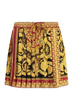 可愛いクリスマスツリーやギフトが！ VERSACE(ヴェルサーチェ) スカート(レディース) - 海外通販のBUYMA スカート