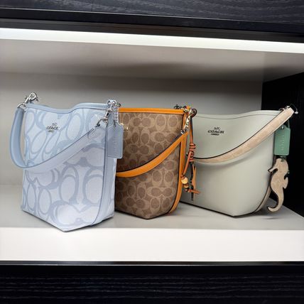 オレンジ系 Coach(コーチ) - 海外通販のBUYMA