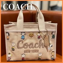 スヌーピーコラボ♪【COACH】ピーナッツ カーゴ トートバッグ 26