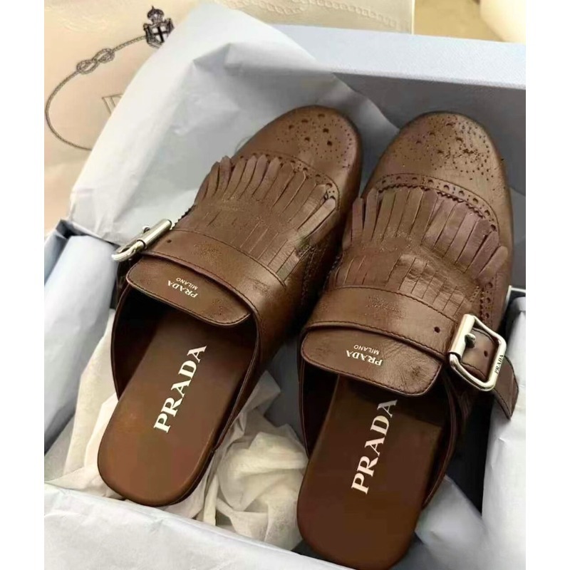 Precious掲載★PRADA レザー ミュール シャッフル フリンジ付