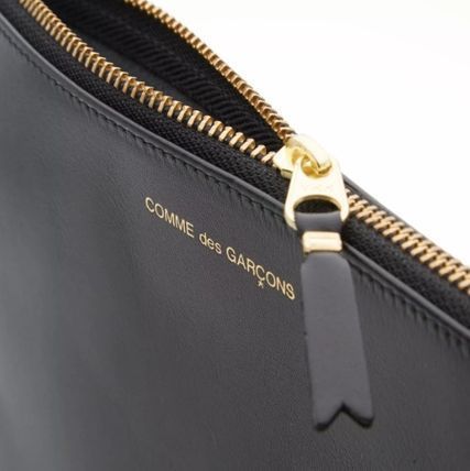 送関込 COMME des GARCONS レザークラッチバッグ ブラック