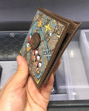 通販人気 グッチ ドナルドダック 二つ折り財布 GGスプリーム