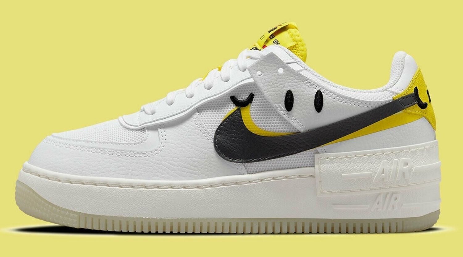 white and yellow nikes