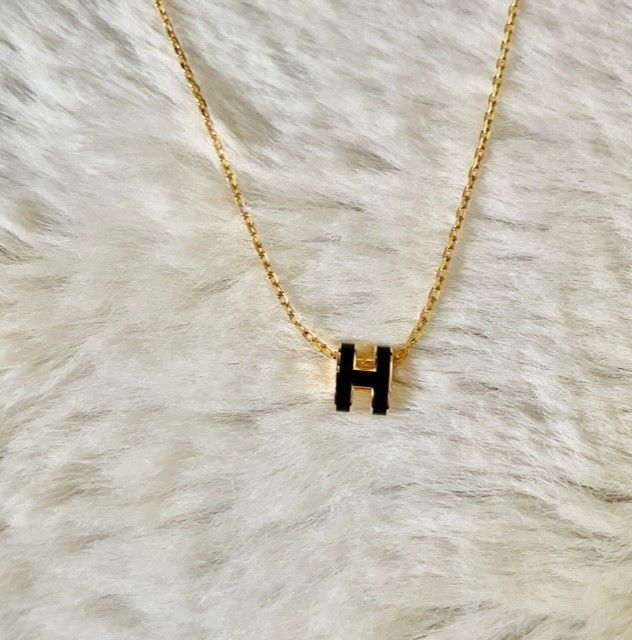 Hermes お待たせ希少入荷！ Mini Pop H pendant Noir/Gold
