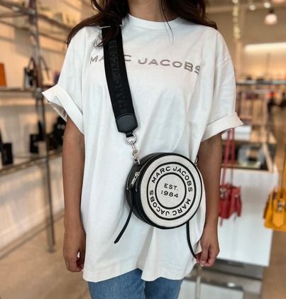 Marc Jacobs キャンバス ショルダー バッグ 関税送料込 MARC JACOBS キャンバス レザー 丸形クロスボディー 関税送料込