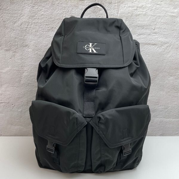 Calvin Klein】 カルバンクライン Reversible Flap Backpack
